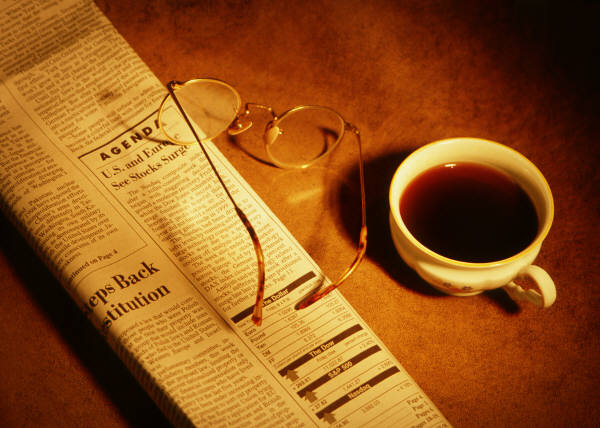 MP900341903_newspaper_with_coffee
